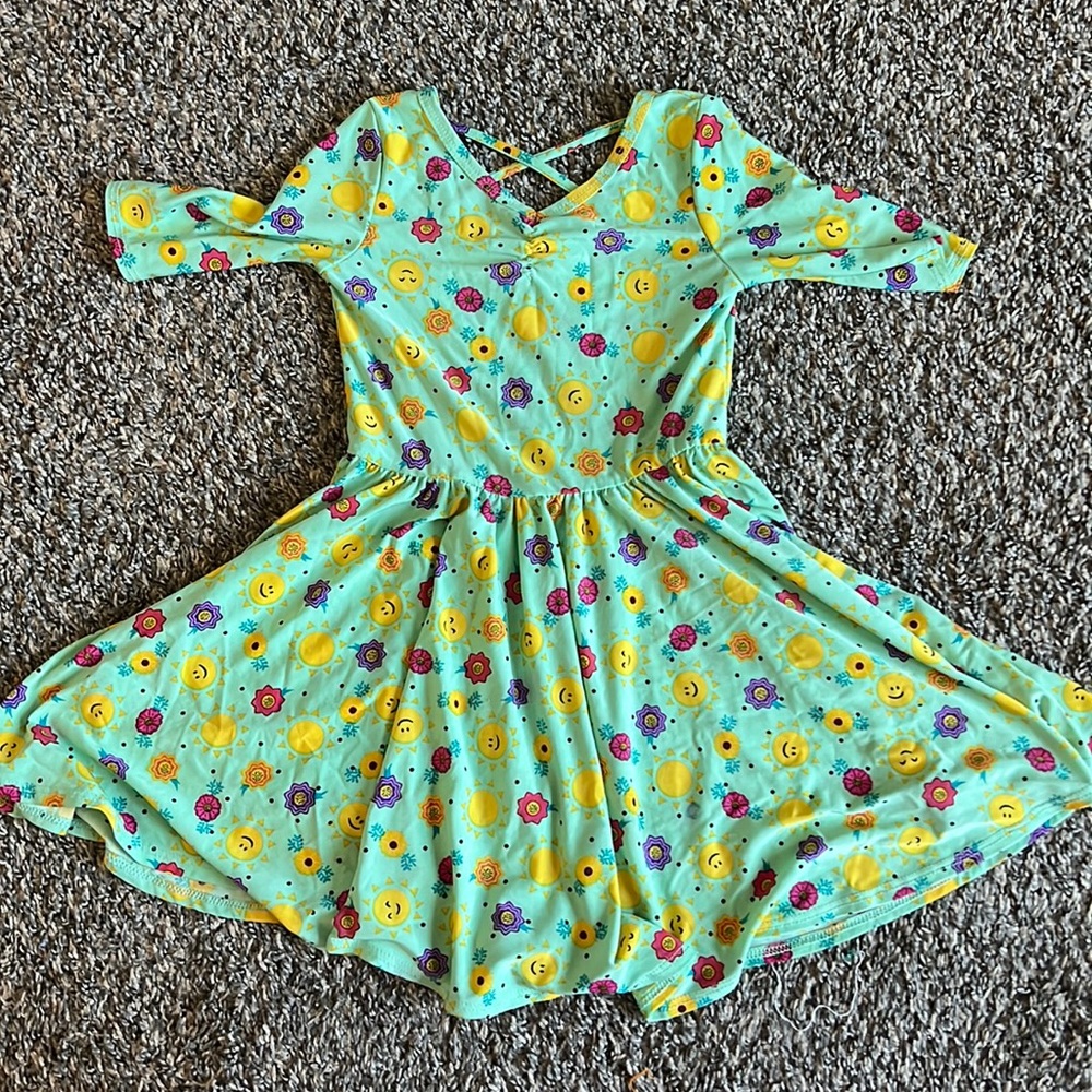 Colorful dress with flowers and smiles